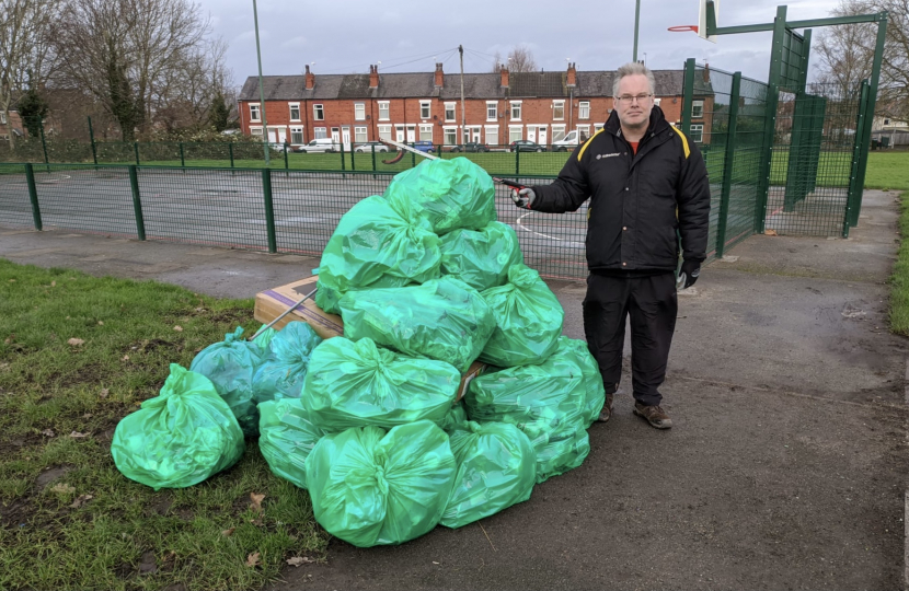 Roger and Filled Green Bags